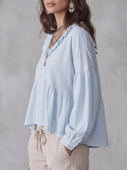 Damenbluse in lockerer Silhouette als modischer Alltagslook