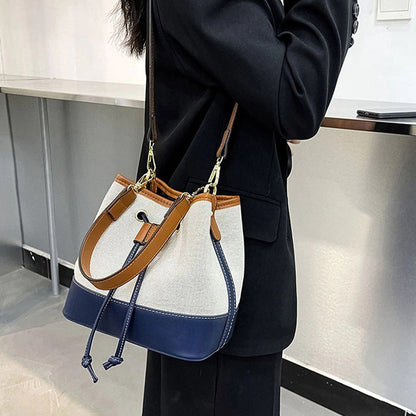 Canvas-Eimer-Tasche mit veganem Lederbesatz und Kordelverschluss