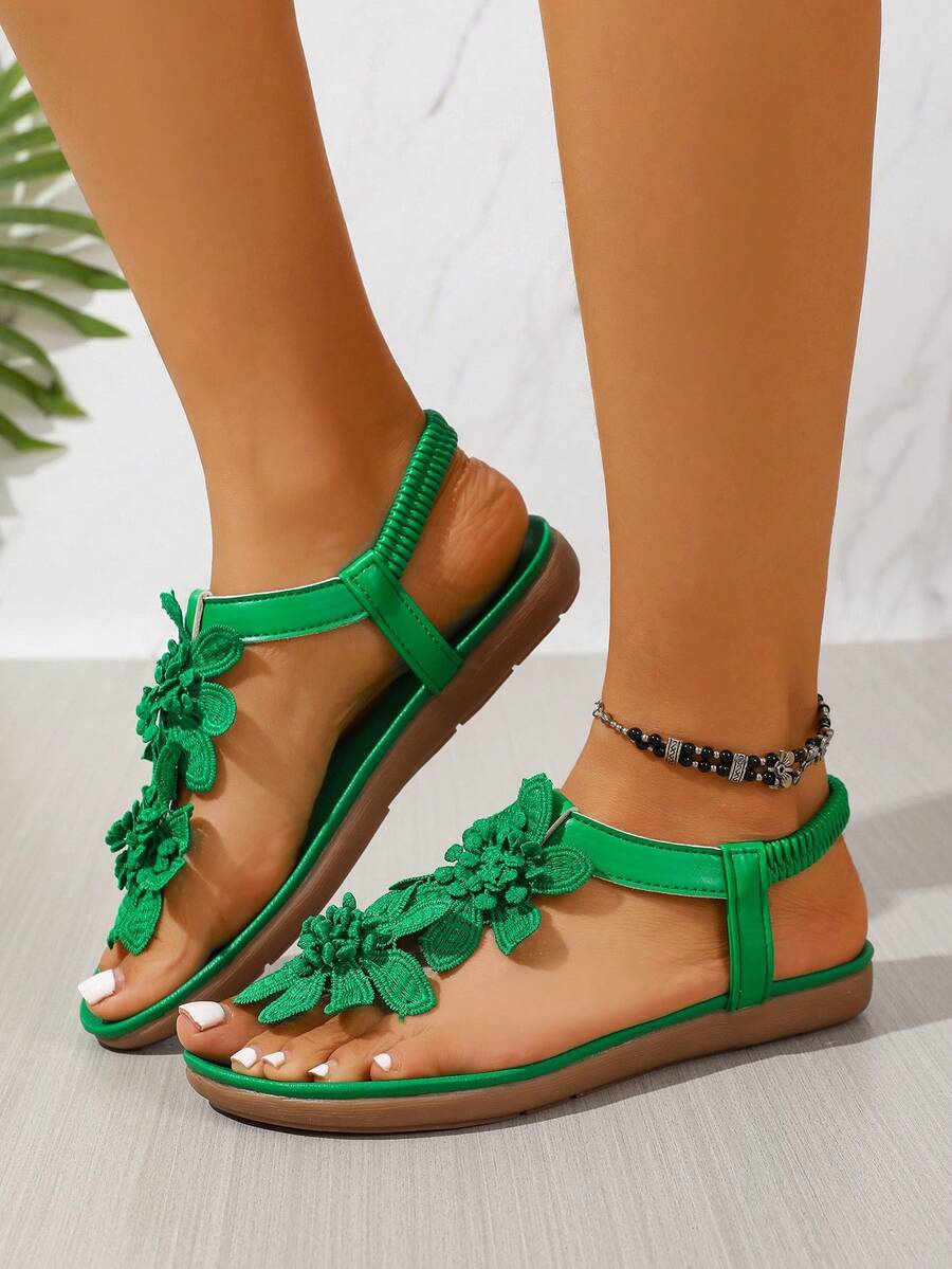 Damen Sandalen mit strukturierter Sohle und Blumenapplikation