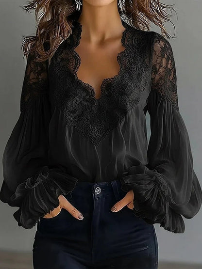Damenbluse mit Spitzen-Patchwork und Puffärmeln