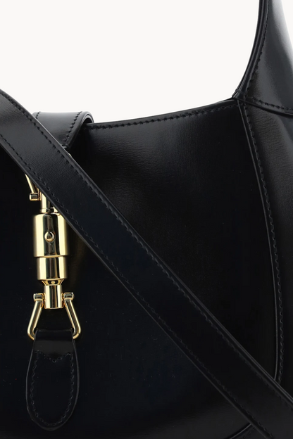 Eterna Noir | Elegante Umhängetasche aus veganem Ultrafiber mit goldener Schließe für Damen