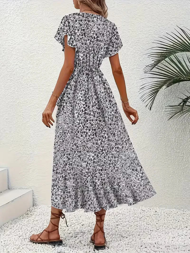 Midi-Wickelkleid mit Blumenmuster und asymmetrischem Saum