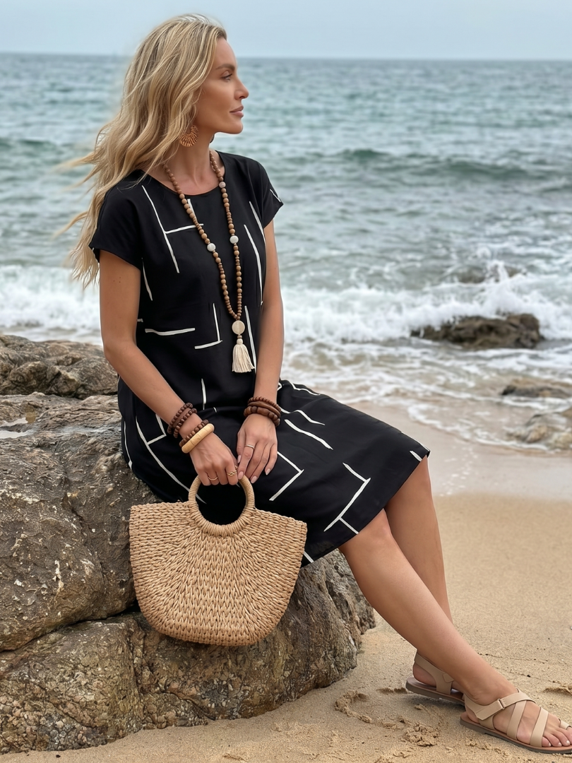 Leichtes Kleid mit abstraktem Druck und geradem Schnitt