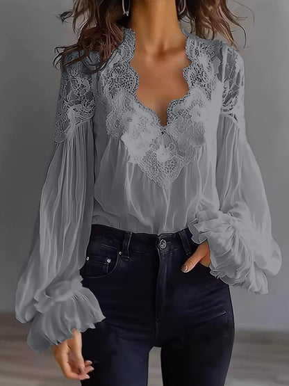 Damenbluse mit Spitzen-Patchwork und Puffärmeln