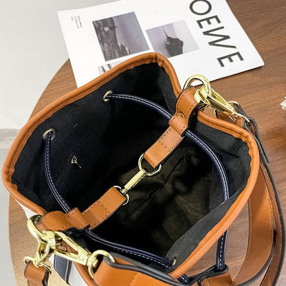 Canvas-Eimer-Tasche mit veganem Lederbesatz und Kordelverschluss