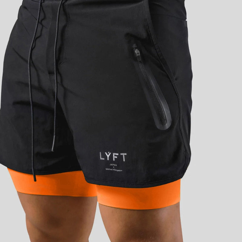 Herren-Trainingshose mit integrierten Kompressionsshorts