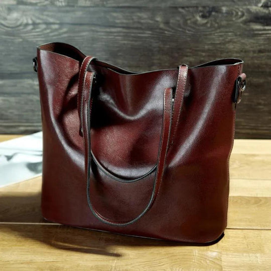 Glänzende geräumige Schultertasche für Damen