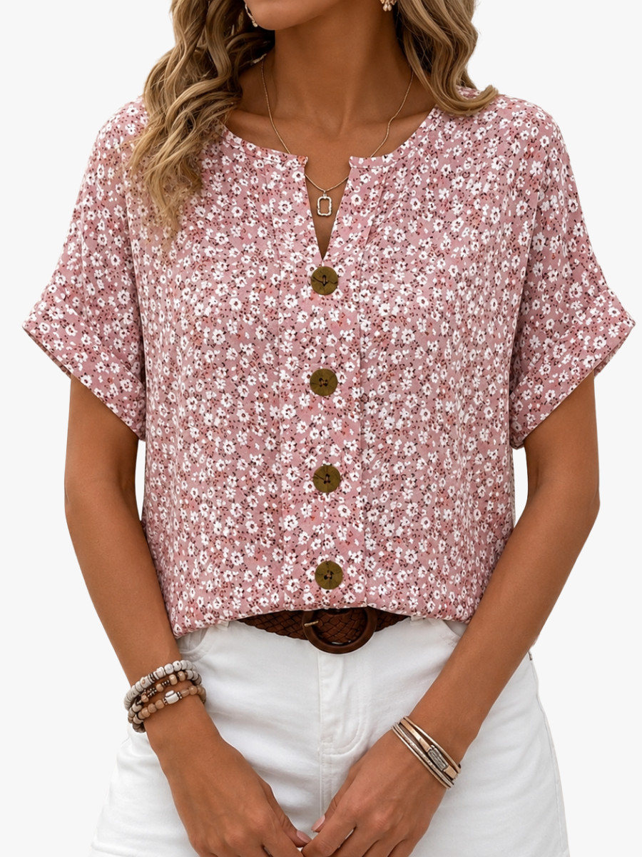 Damenbluse mit Blumenmuster und fließendem Fall in Vorderansicht