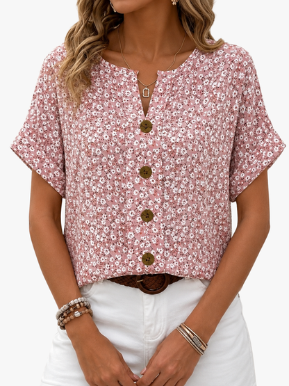 Damenbluse mit Blumenmuster und fließendem Fall in Vorderansicht