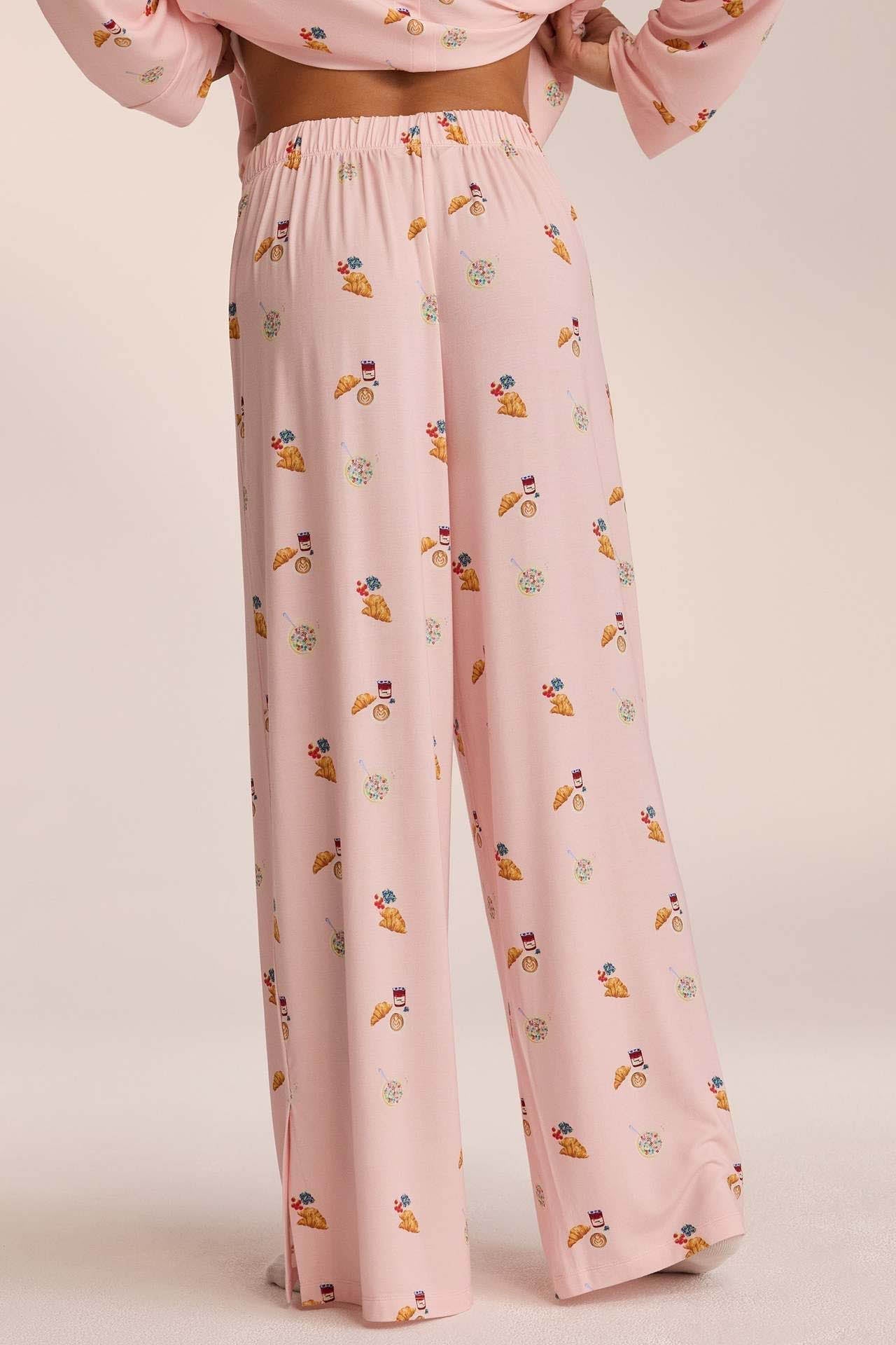 Elegantes Set für Damen mit gemustertem Oberteil und weiter Hose