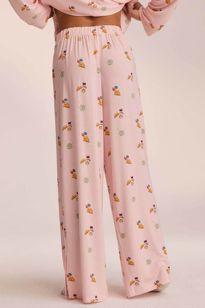 Elegantes Set für Damen mit gemustertem Oberteil und weiter Hose