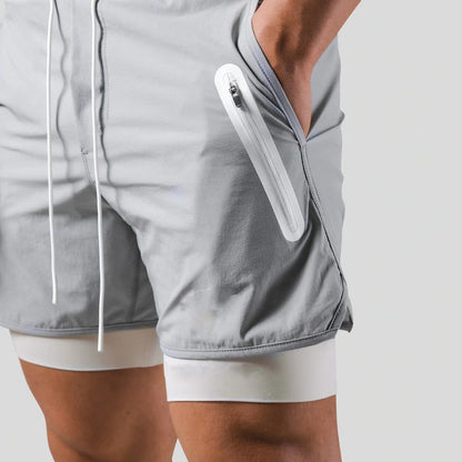 Herren-Trainingshose mit integrierten Kompressionsshorts