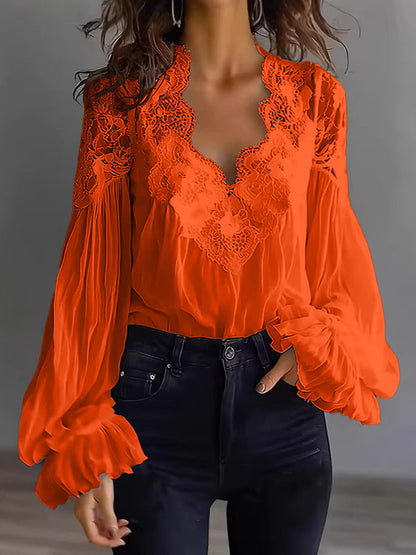 Damenbluse mit Spitzen-Patchwork und Puffärmeln