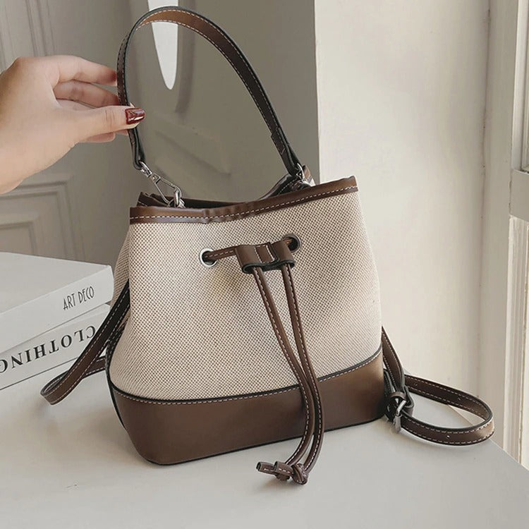 Canvas-Eimer-Tasche mit veganem Lederbesatz und Kordelverschluss
