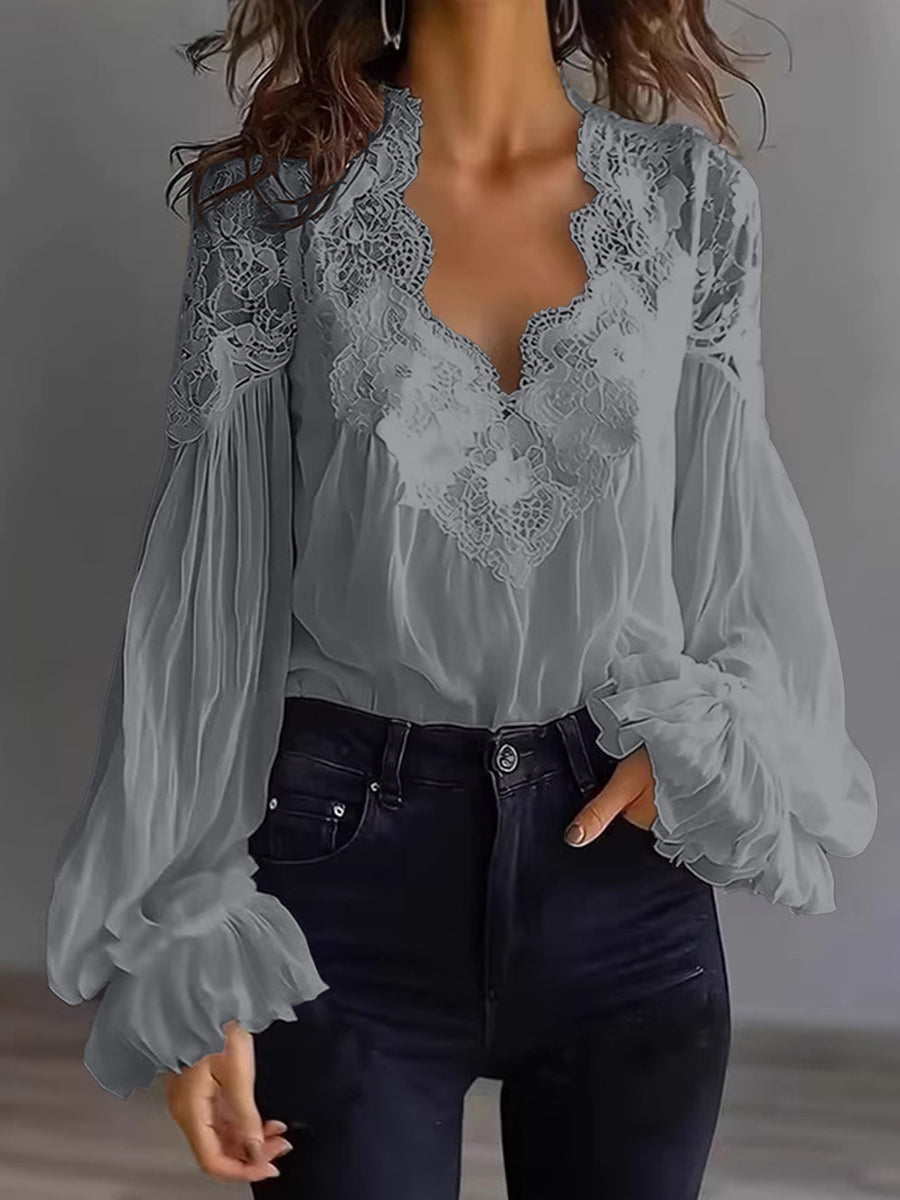 Damenbluse mit Spitzen-Patchwork und Puffärmeln