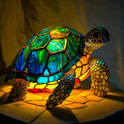 Kunstvolle Tier-Tischlampe mit Buntglaseffekt