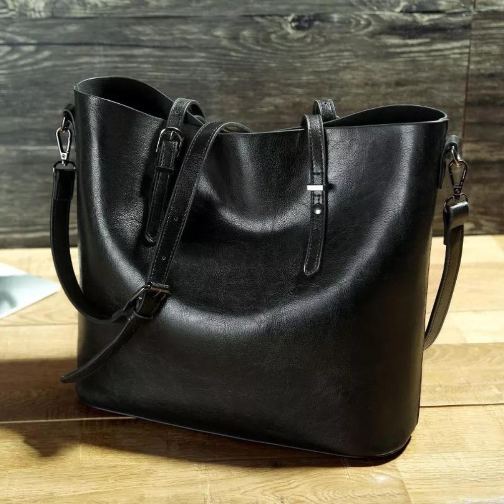 Glänzende geräumige Schultertasche für Damen