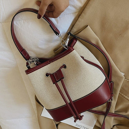 Canvas-Eimer-Tasche mit veganem Lederbesatz und Kordelverschluss