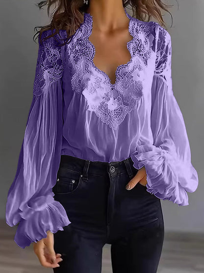 Damenbluse mit Spitzen-Patchwork und Puffärmeln