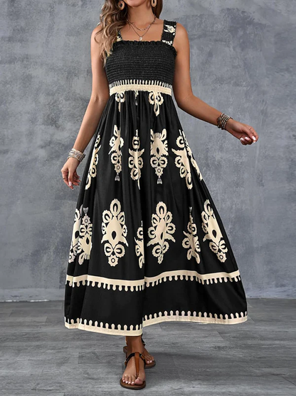 Maxikleid mit geometrischem Muster und Smok-Details