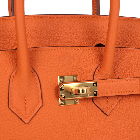 Elegante feste Handtasche mit Goldakzenten für Damen