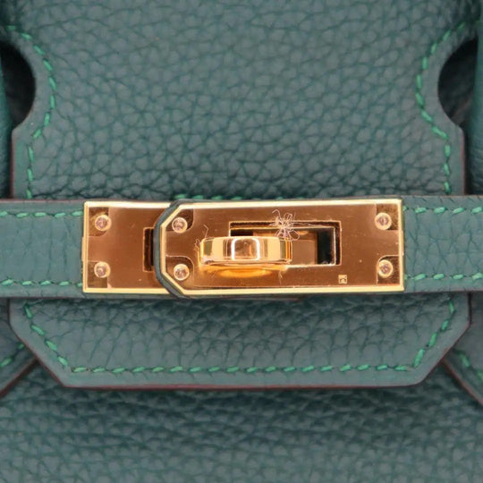 Elegante feste Handtasche mit Goldakzenten für Damen