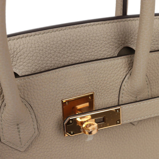 Elegante feste Handtasche mit Goldakzenten für Damen
